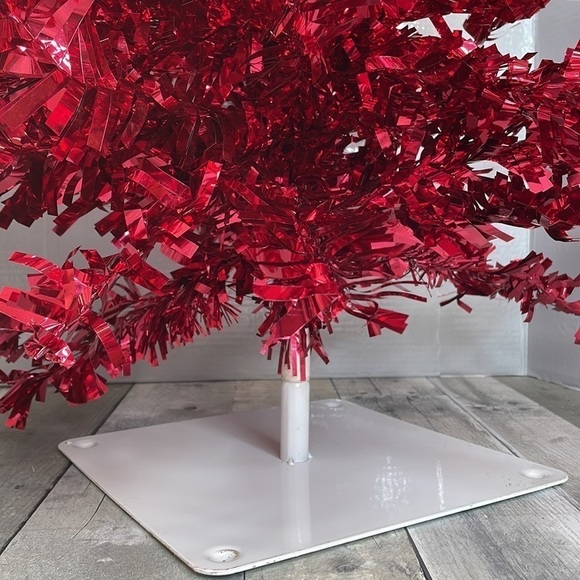 Red tinsel Christmas tree on a white metal base.  Approx 4’ tall. Light weight. - Picture 3 of 8